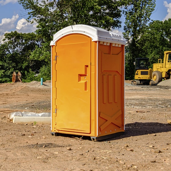 how often are the portable restrooms cleaned and serviced during a rental period in Springport